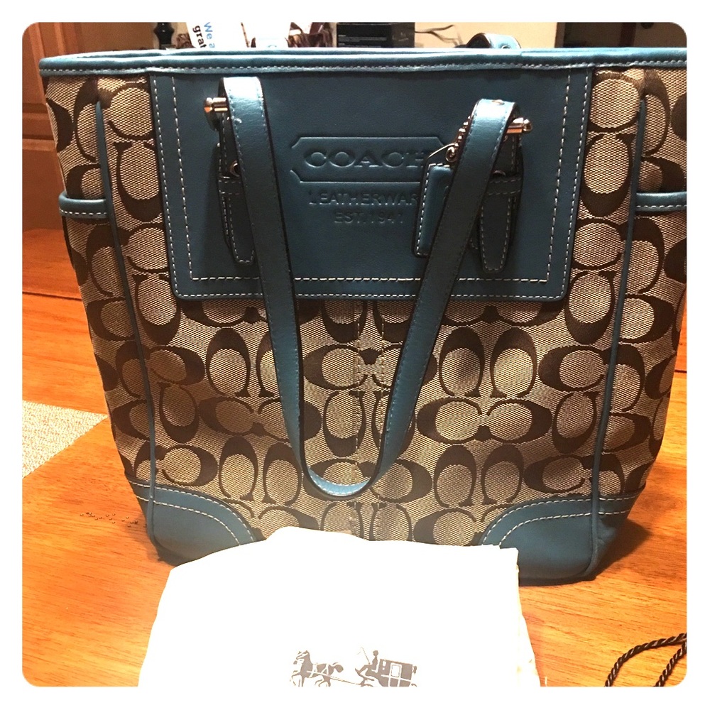 Classic C coach purse with teal accents.